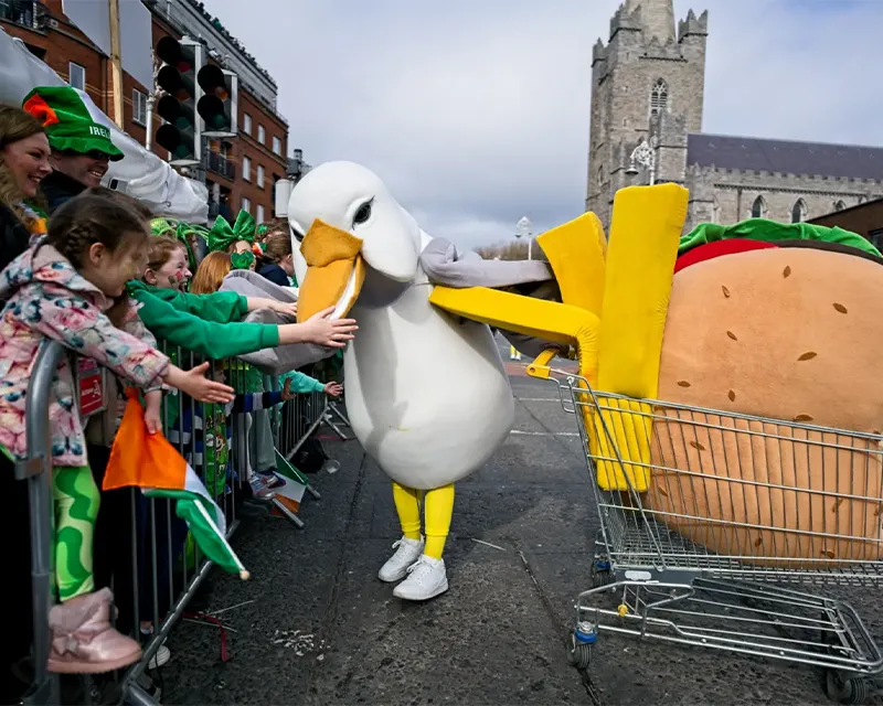 Duck Mascot with shopping cart