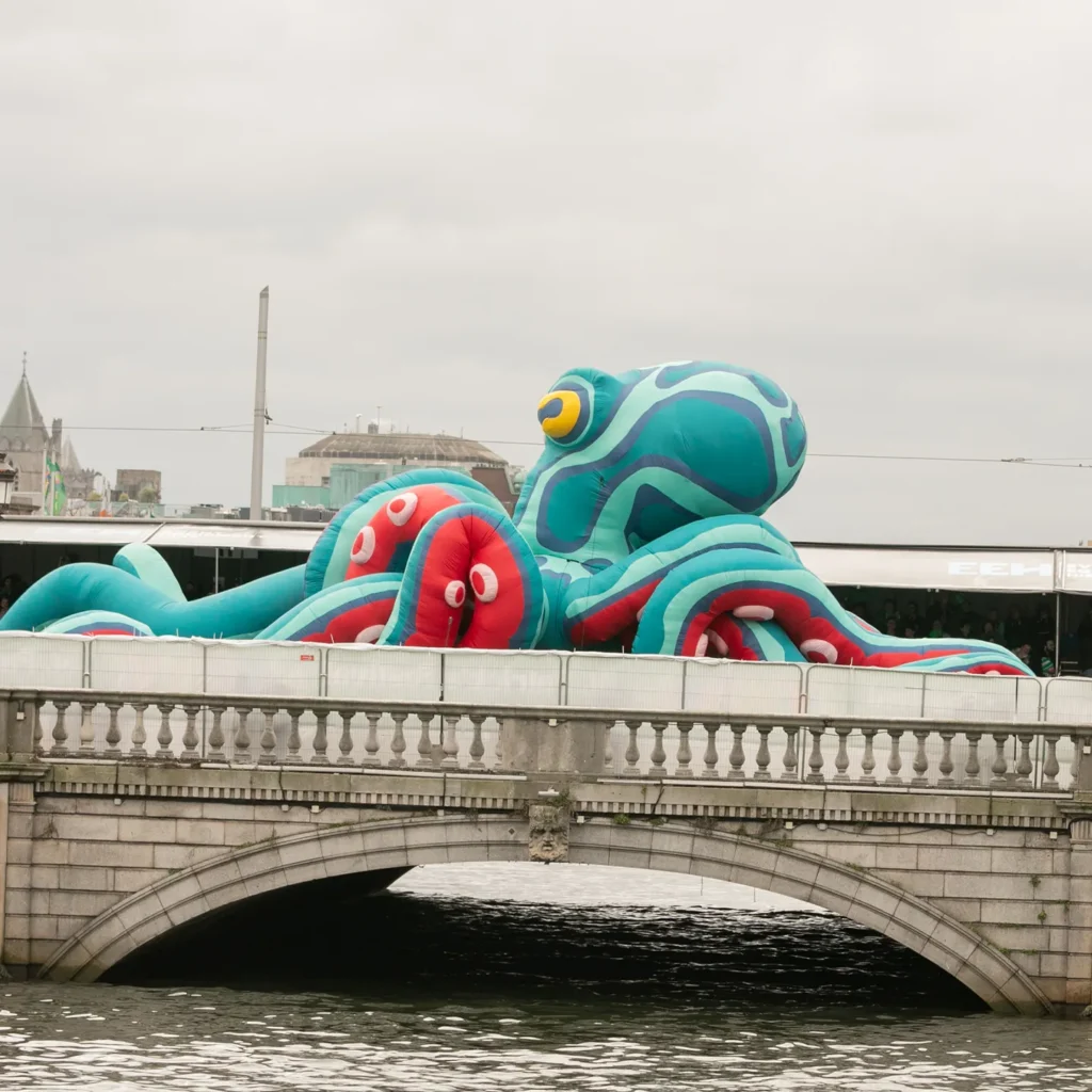 Large Inflatable octopus going over a bridge